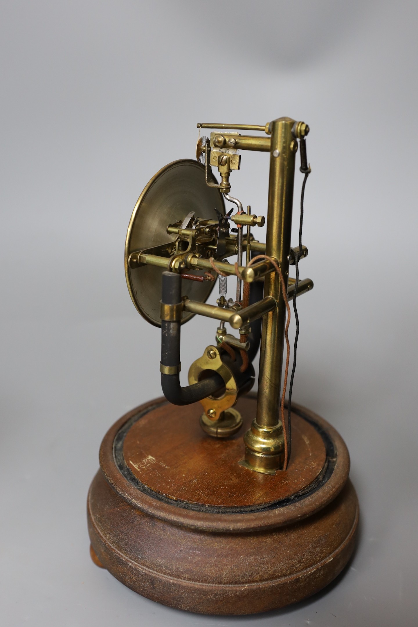 A Bulle electric clock under a glass dome, 28 cms high